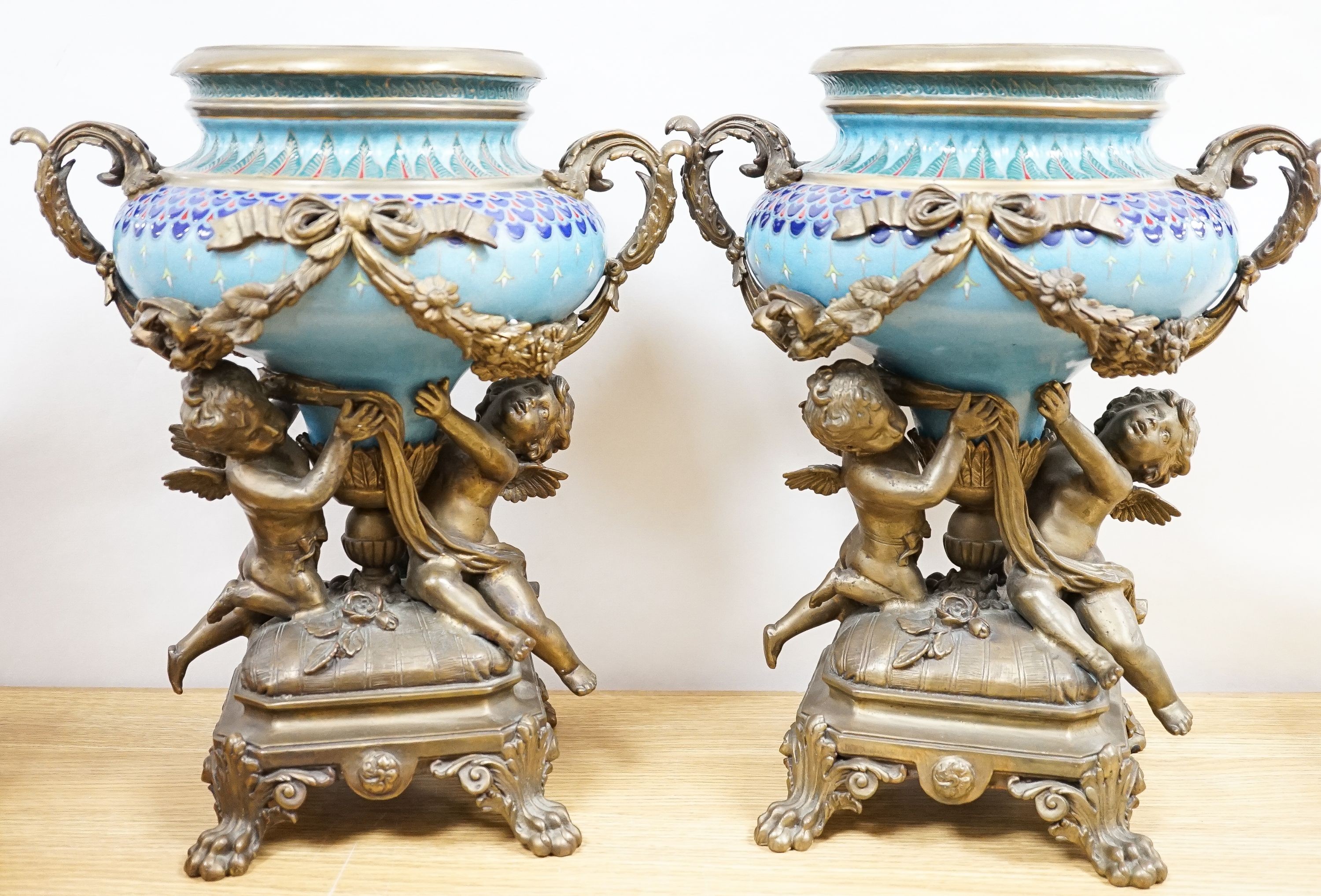 A pair of large ormolu mounted earthenware vases 39cm